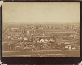[View from the roof of George Ehret's home at Park Avenue and 94th Street.] Looking north by east. Shows car barn (Round House for Third Avenue El).