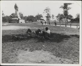 [Destitute men sleeping in park.]