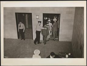 French Line, 610 Fifth Ave., "Normandie" Leaving Pier #88 N.R., Pier Scenes, Passengers Entering Elevators on Upper Level.