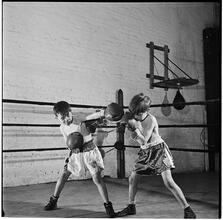 Boxing [at the] Police Athletic League [Two boys boxing.]