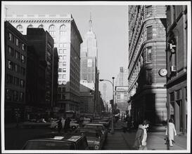 [Looking north on Fifth Avenue toward the Empire State Building.]