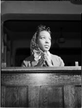[Girl praying.]