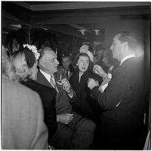 Champagne Cholly Book Party [Group of people talking.]