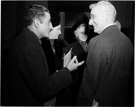 Dale Carnegie [Dale Carnegie talking to a group of people.]