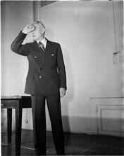 Dale Carnegie [Dale Carnegie teaching a class on public speaking.]