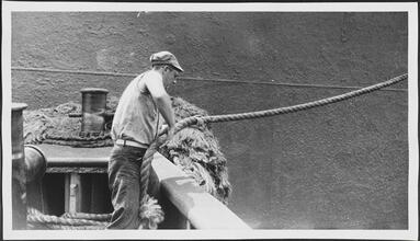 [Crew member on the ferry.]