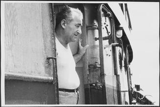 [Crew member on the ferry.]