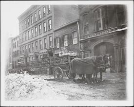 [Horse-drawn fire engine.]