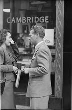 Street Conversations [Man and woman talking on the street.]