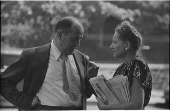 Street Conversations [Man and woman talking.]
