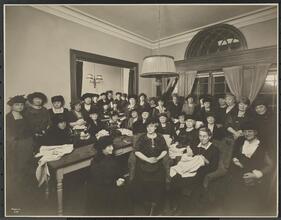 Interior, Group, Women's Sewing Circle at 2307 B'way Between 83 & 84 Sts.