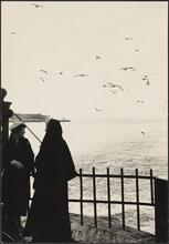 [Two women on the ferry.]