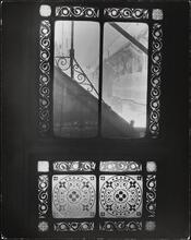 [Window detail at elevated railroad station.]