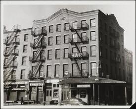 [South Street at the corner of Peck Slip.]