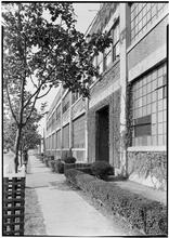 Rex Cole [Warehouse], 2511 Hunterspoint Avenue, Long Island City. Sharp exterior view down sidewalk.