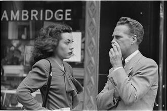 Street Conversations [Man and woman talking on the street.]