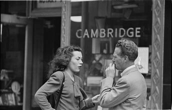Street Conversations [Man and woman talking on the street.]