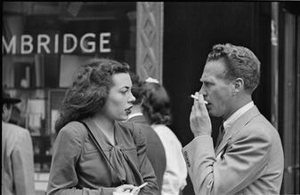 Street Conversations [Man and woman talking on the street.]