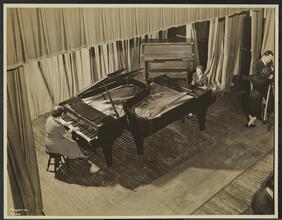 New York Association for the Blind, Interior, 2 Girls Playing Pianos.