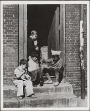 Lower East Side boys with collected newspapers