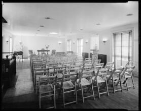 [Room set up for a presentation.]