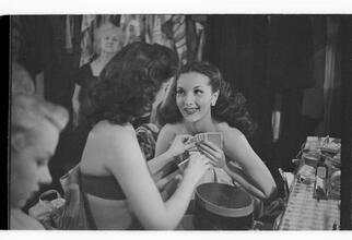 Show Girl [Rosemary Williams playing cards in the dressing room.]
