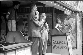 [Sideshow talker and performers for Palace of Wonders.]