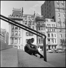 [Couple sitting on steps to the Met.]