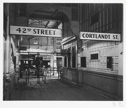 The Weehawken Ferry Story [Weehawken Ferry Terminal with signs for 42nd Street and Cortlandt Street.]