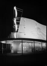 [Night view of the Production and Distribution building, New York World's Fair.]