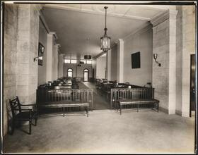 [Interior, office space and waiting area.]