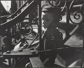 Lonely Boy Sitting on a Stoop, Waiting for His Mother.