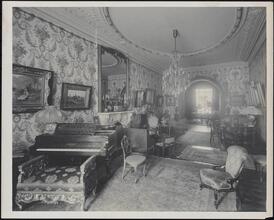 [Residence. Interior, parlor.]
