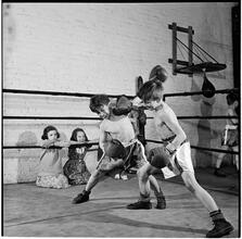 Boxing [at the] Police Athletic League [Two boys boxing.]