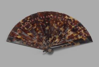 Brisé fan of tortoise shell