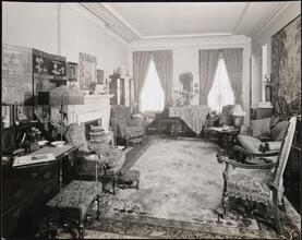[Residence. Interior, parlor.]