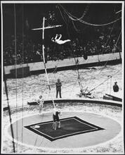[Acrobats at a circus.]