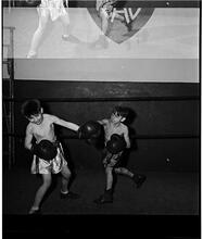 Boxing [at the] Police Athletic League [Two boys boxing.]
