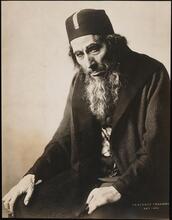 [George Arliss as Shylock in "The Merchant of Venice".]