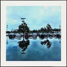 A partially submerged auto dealership in the aftermath of Hurricane Sandy, New Jersey
