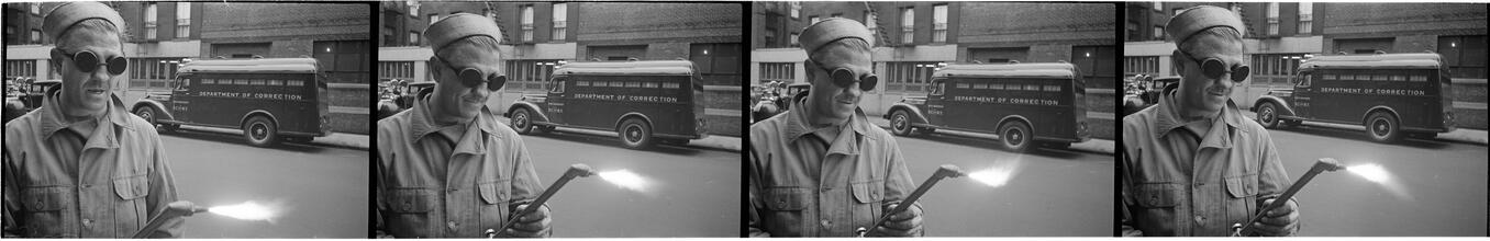 Paddy Wagon [Man with welding equipment used in the making of the television show Paddy Wagon.]