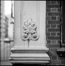 [Ornamentation on unidentified building.]