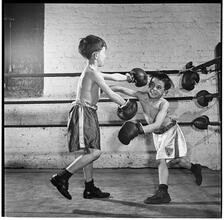 Boxing [at the] Police Athletic League [Two boys boxing.]