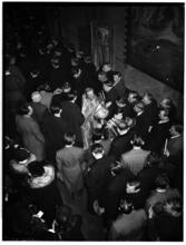 [Overhead view of a congregation during a religious service.]