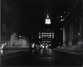 [Looking south from the steps of New York Public Library's main branch toward the Empire State Building.]