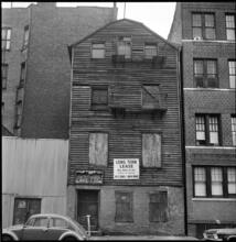 [Old wood framed house, 203 East 29th Street.]