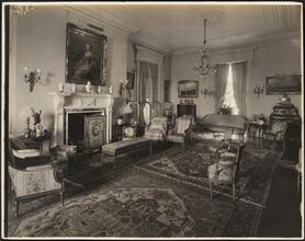 [Residence. Interior, parlor.]