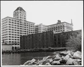 [Walentas Building, Sweeney Building and Empire Stores seen from the East River.]