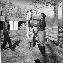 Arthur Godfrey [Godfrey with a horse.]