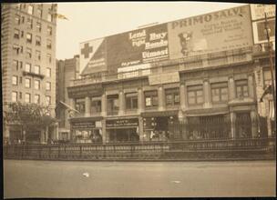 Street Scenes, etc. Showing Displays of Liberty Loan Posters during World War I [Liberty Loan billboard above stores.]